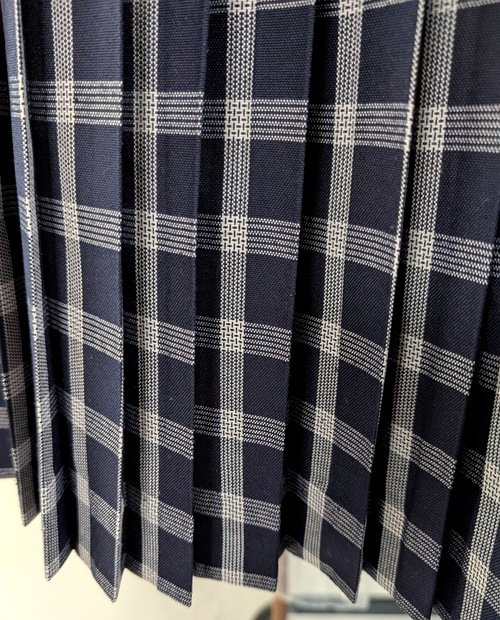 Designer garment care — Gucci dry cleaning in Uptown New Orleans